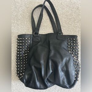 Silver studded black handbag